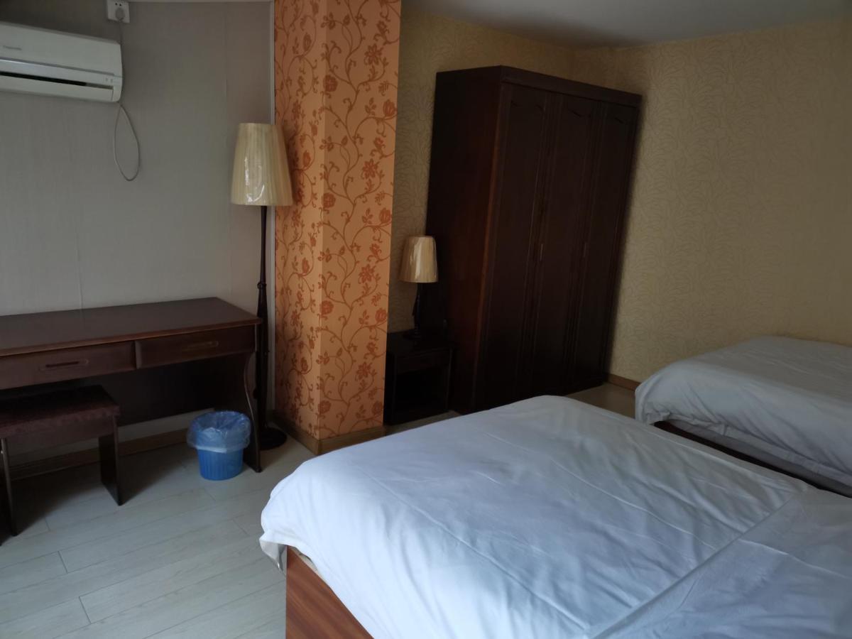 Fubang Hotel Apartment Suifenhe Bagian luar foto