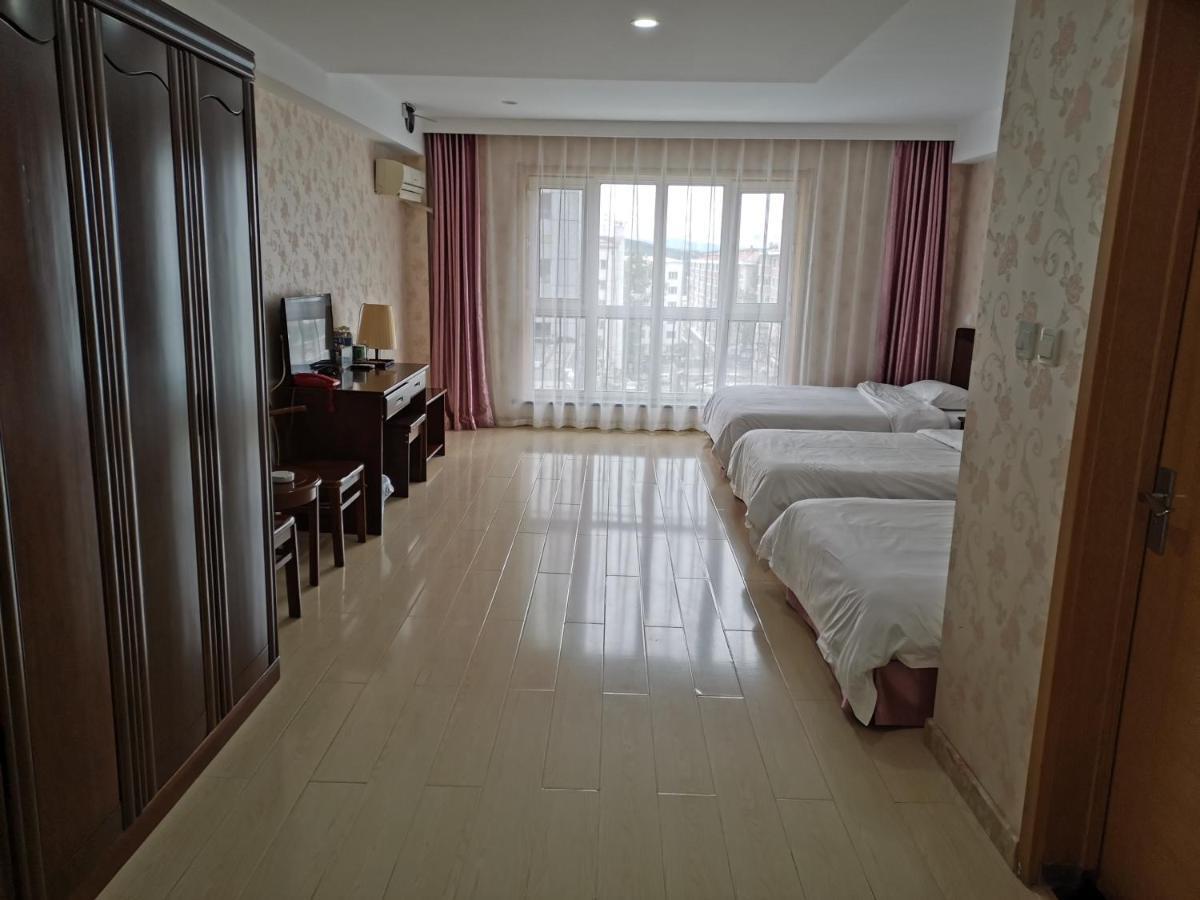 Fubang Hotel Apartment Suifenhe Bagian luar foto